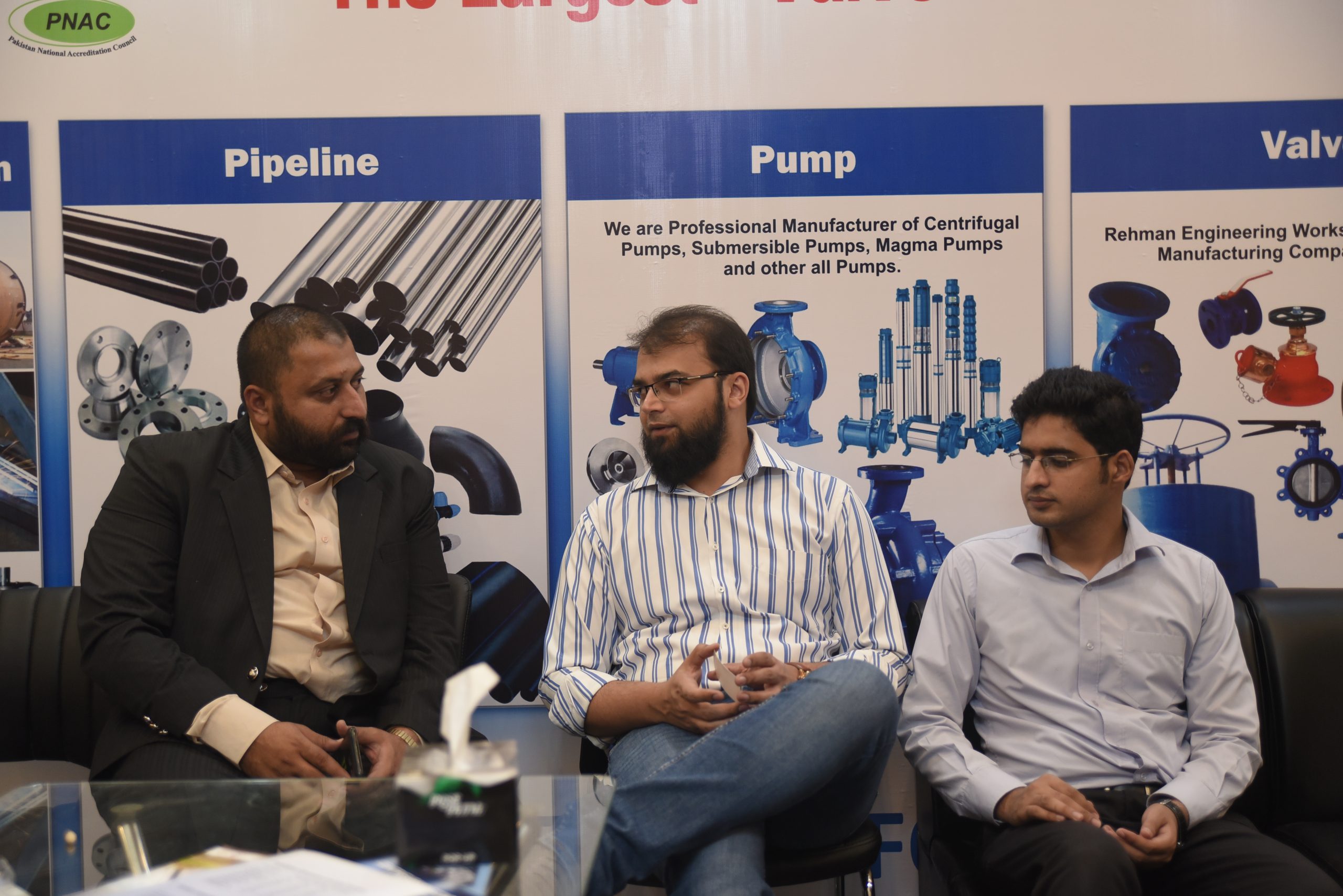 Visitors reviewing product literature